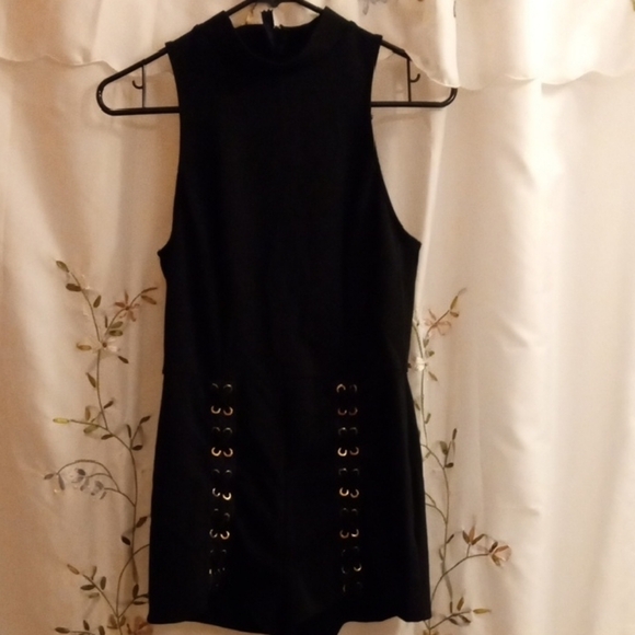 Charlotte Russe Pants - Charlotte Russe Black Sleeveless Romper with Grommet Detail